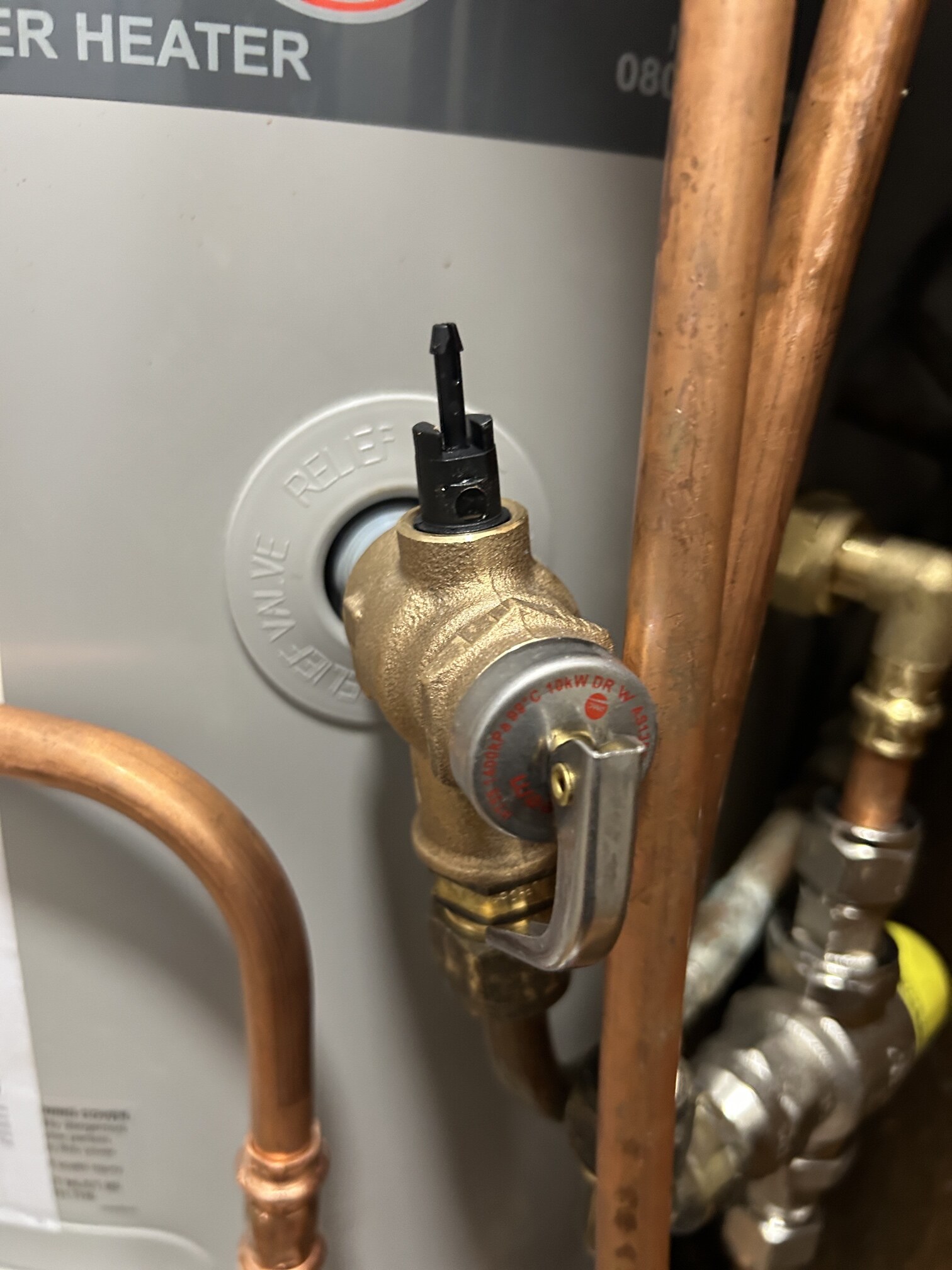 Emergency Hot Water Repairs technician with a new hot water system in Belmore