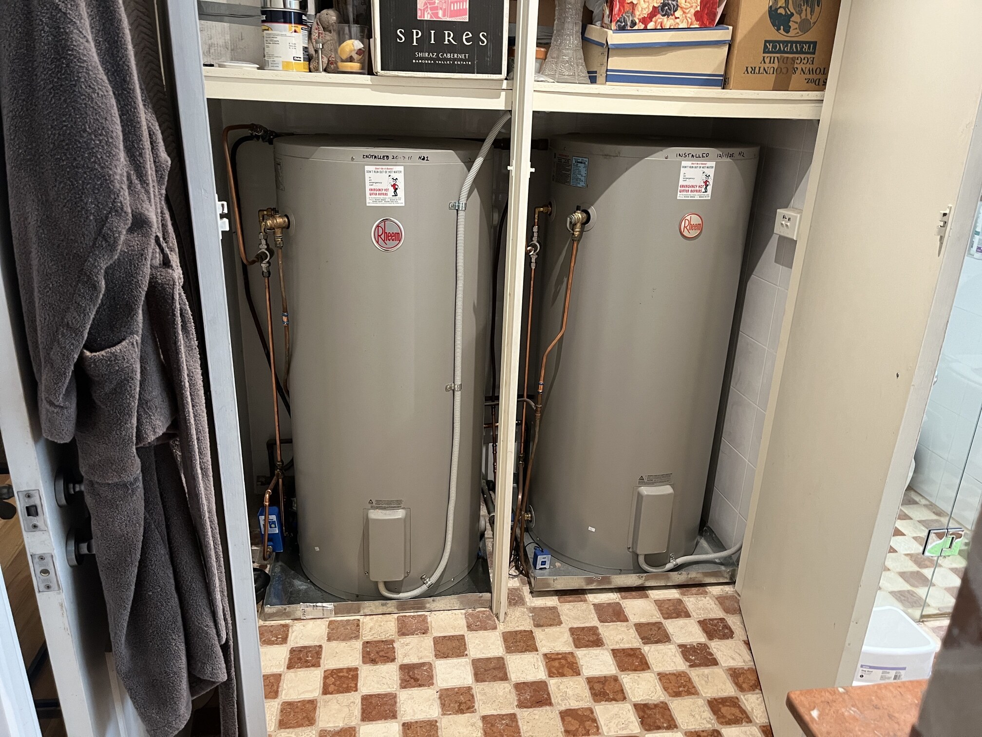 Emergency Hot Water Repairs technician with a new hot water system in Replacements