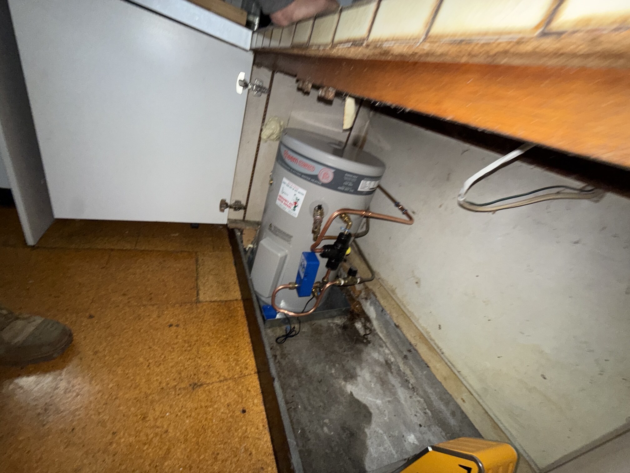 Emergency Hot Water Repairs technician with a new hot water system in Sandringham