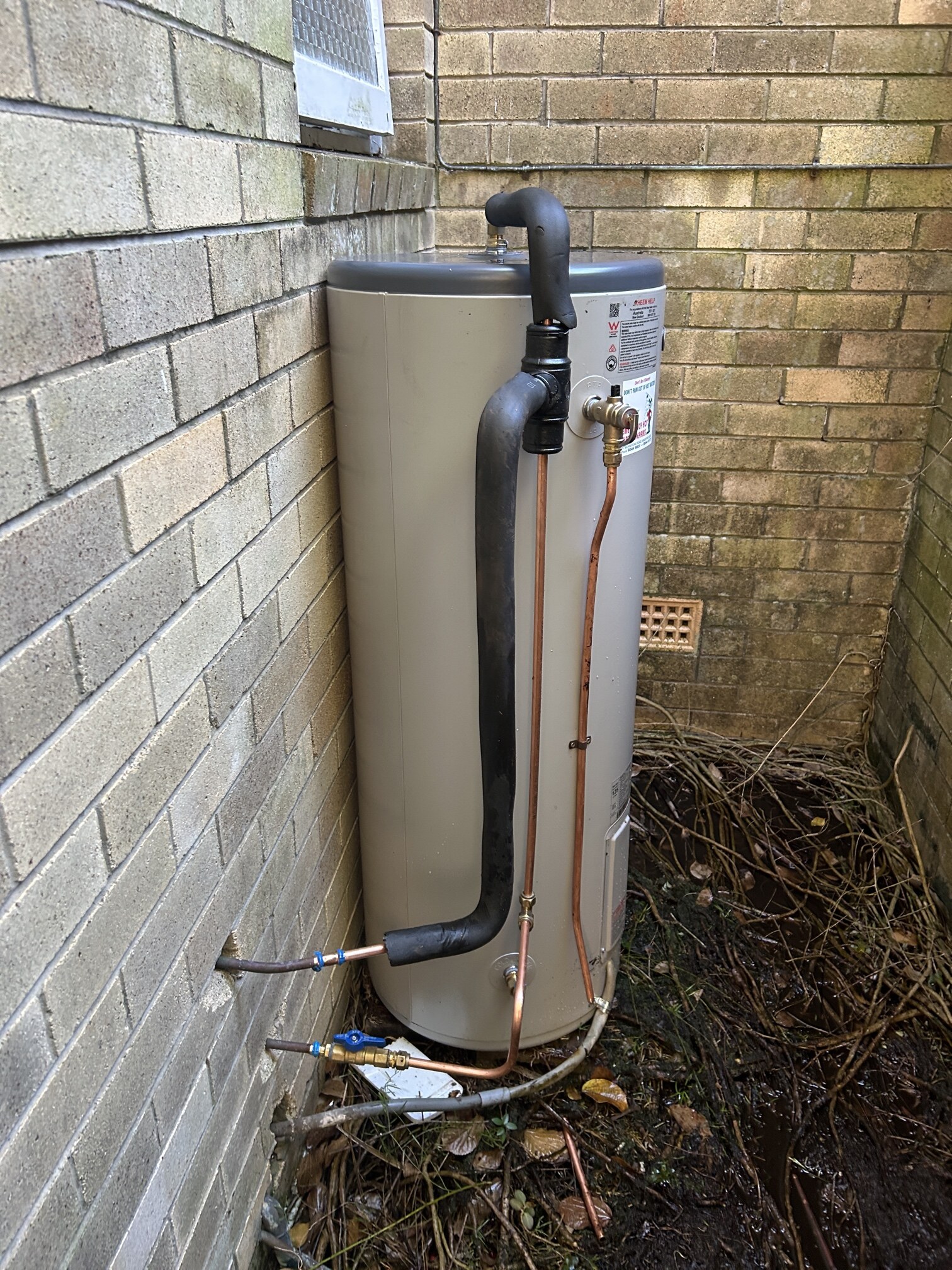 Emergency Hot Water Repairs technician with a new hot water system in Undercliffe