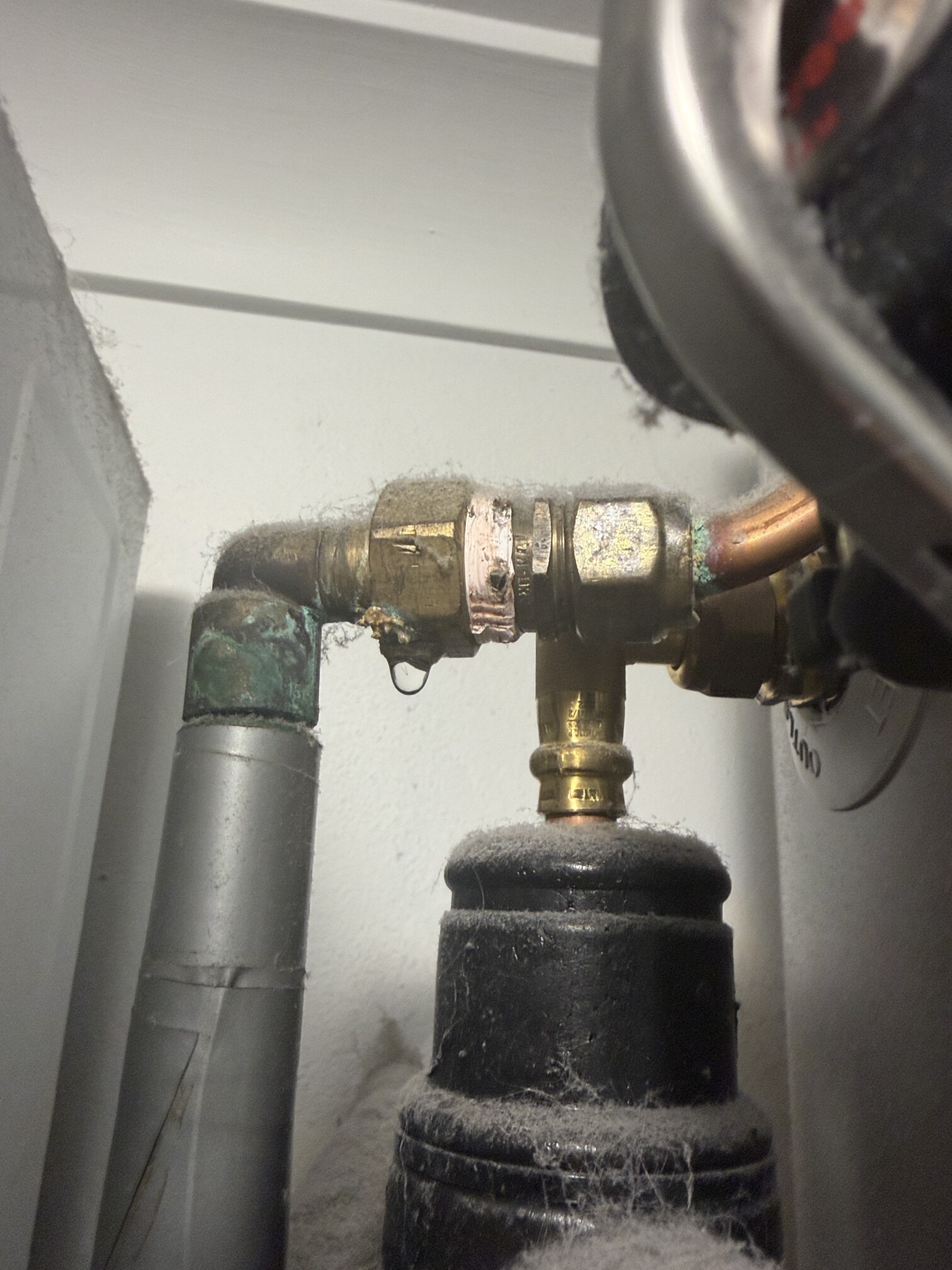 Emergency Hot Water Repairs technician with a new hot water system in Chiswick