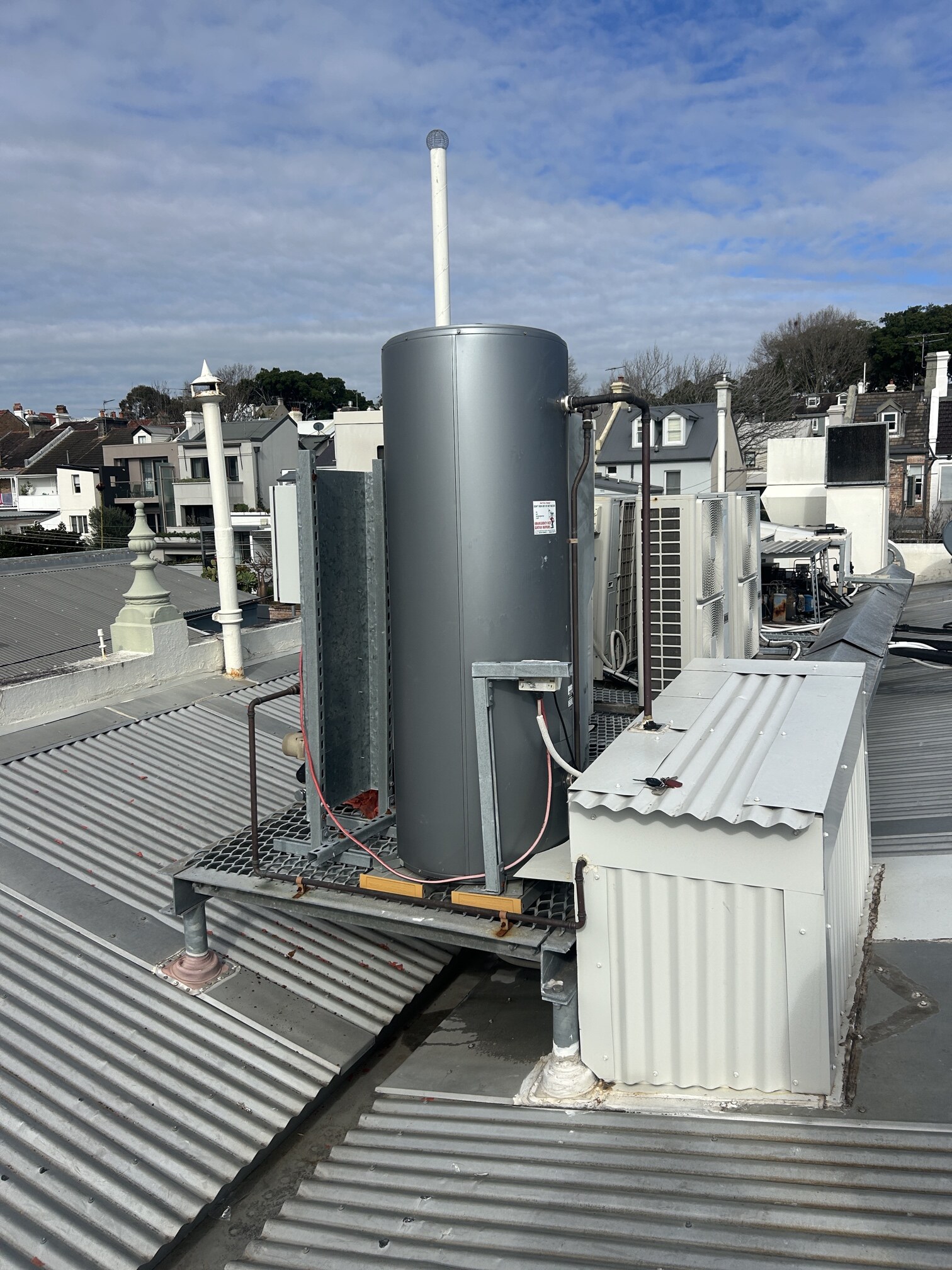 Emergency Hot Water Repairs technician with a new hot water system in Woollahra