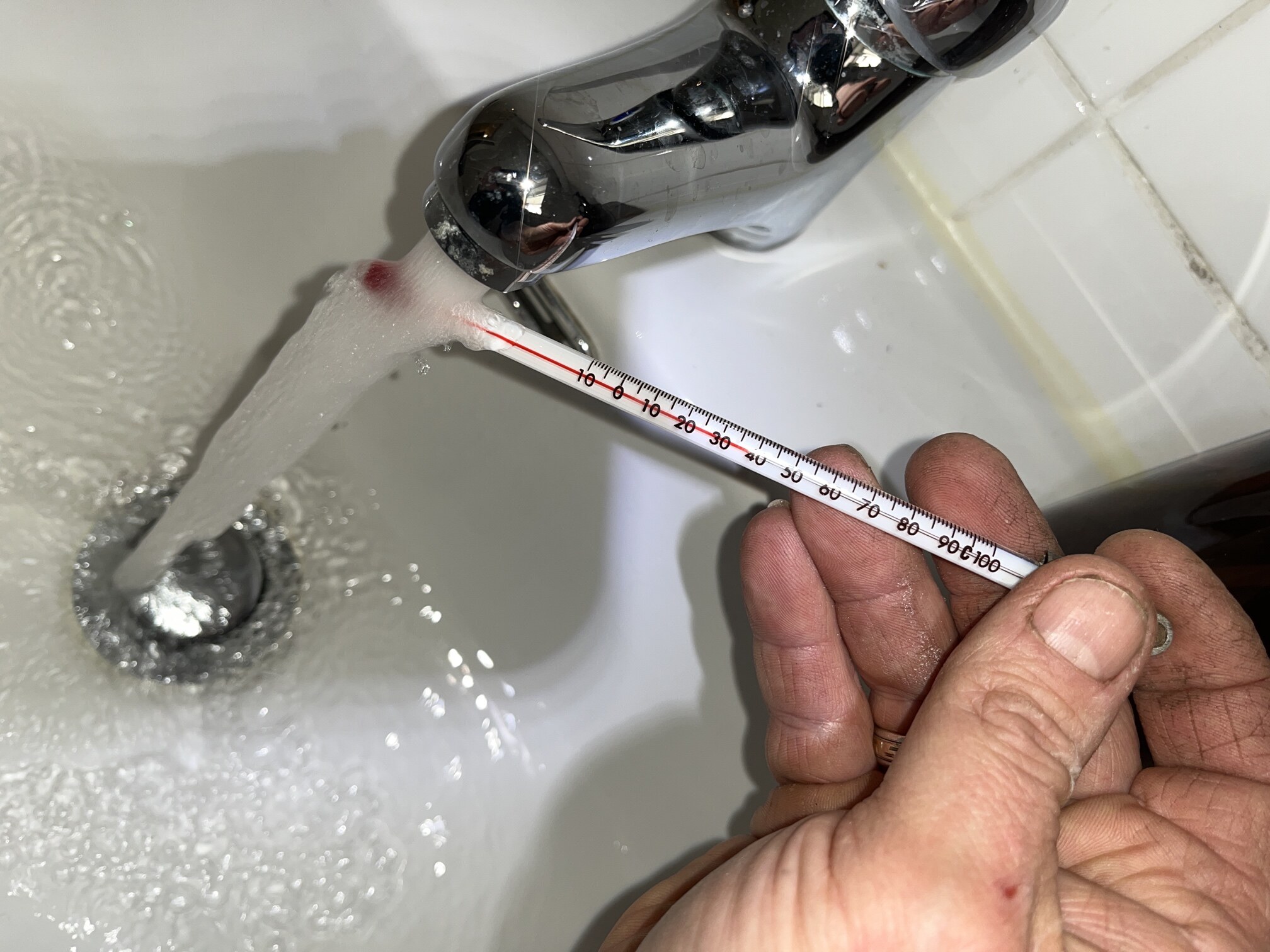 Emergency Hot Water Repairs technician with a new hot water system in Kogarah Bay