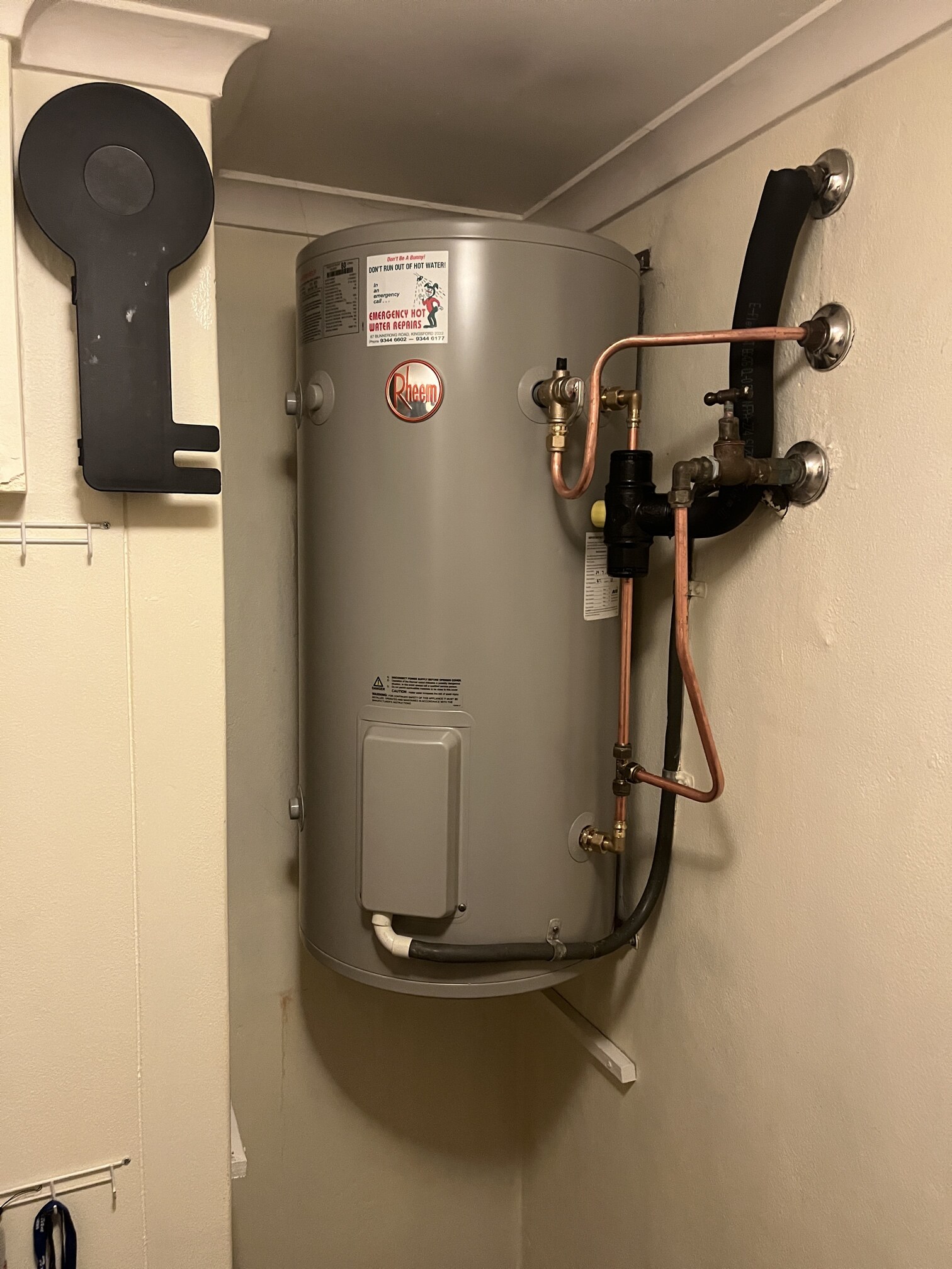 Emergency Hot Water Repairs technician with a new hot water system in Beverley Park