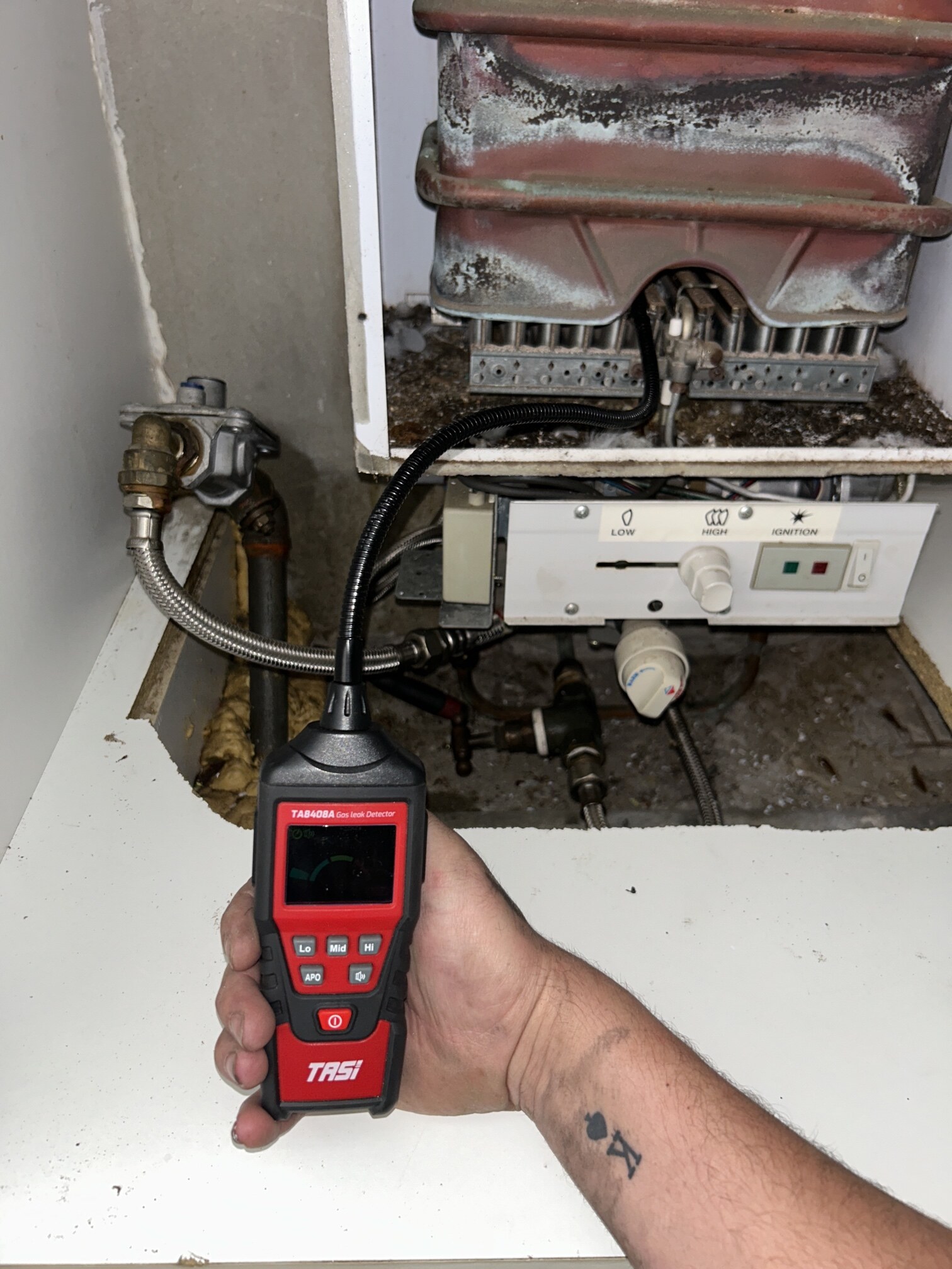 Before and after 250L hot water replacement in Replacements
