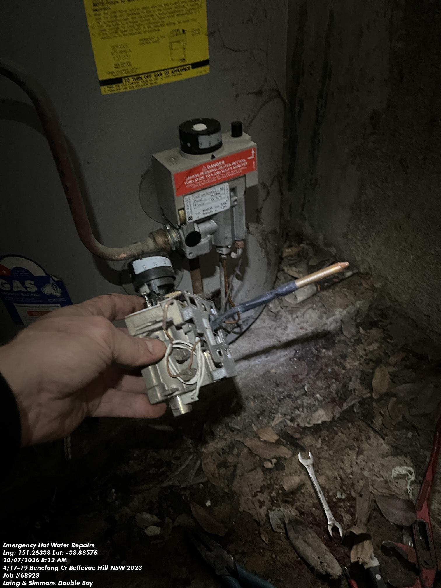 Emergency Hot Water Repairs technician with a new hot water system in Enfield