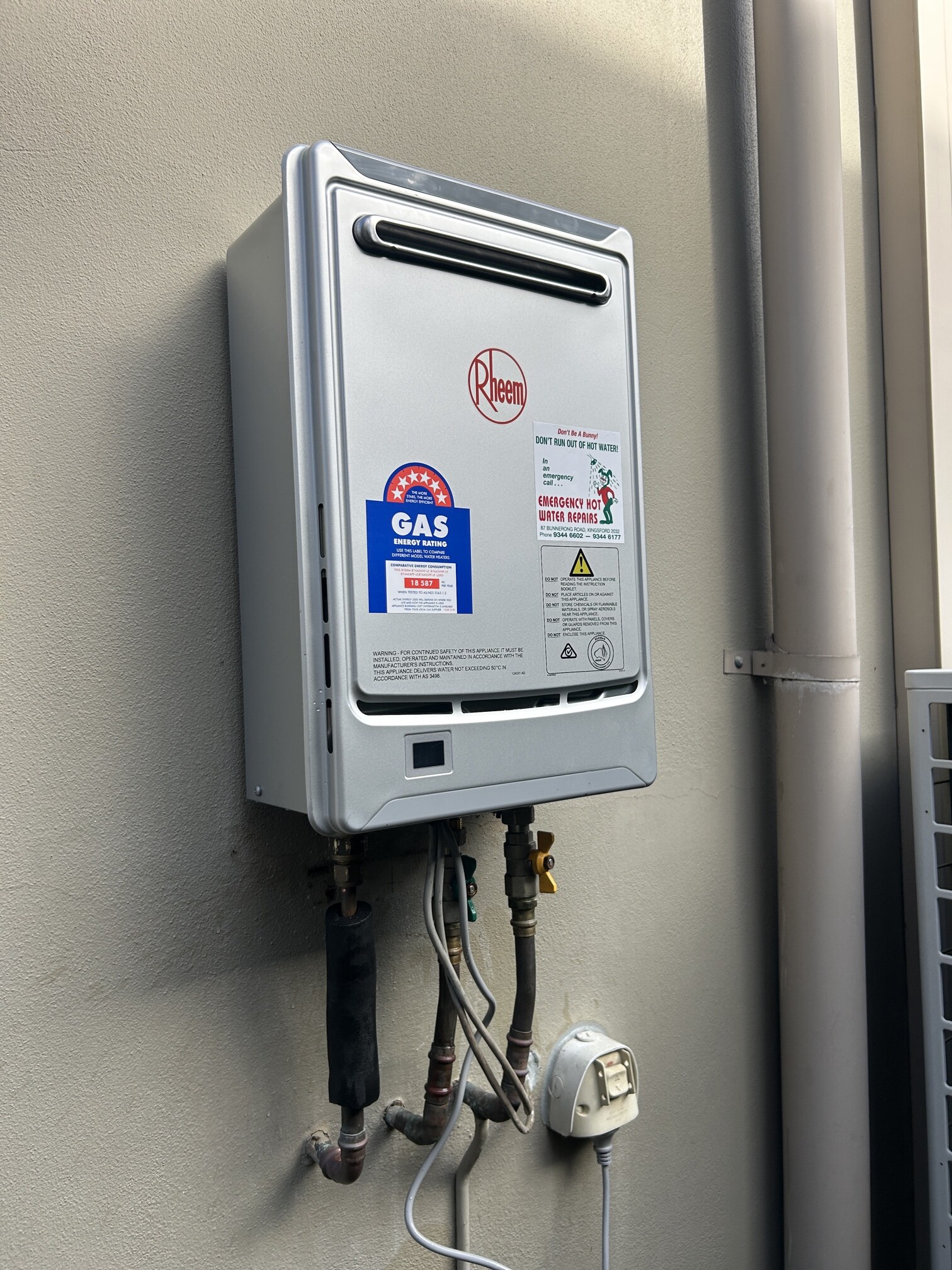 Emergency Hot Water Repairs technician with a new hot water system in Five Dock